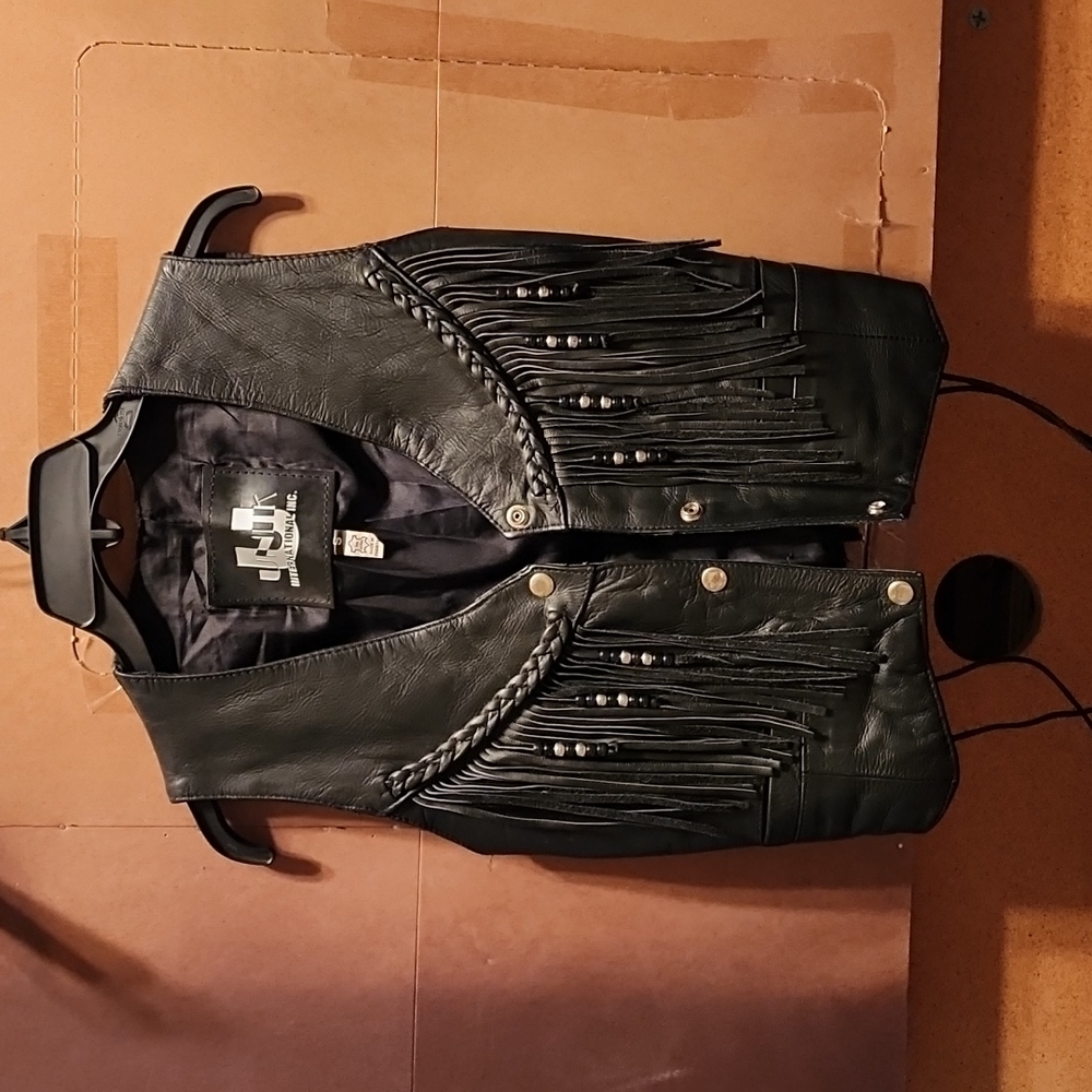 NWOT.                     UNIK International Inc  Black fringe vest
